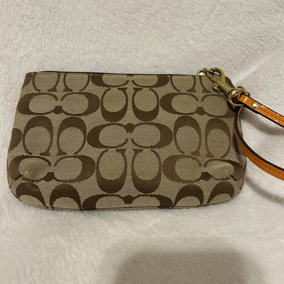 Coach Turn Lock Wristlet - Picture 2 of 5